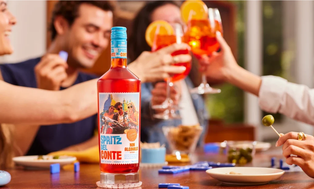 A dinner party where Spritz Del Conte Non-Alcoholic is being enjoyed