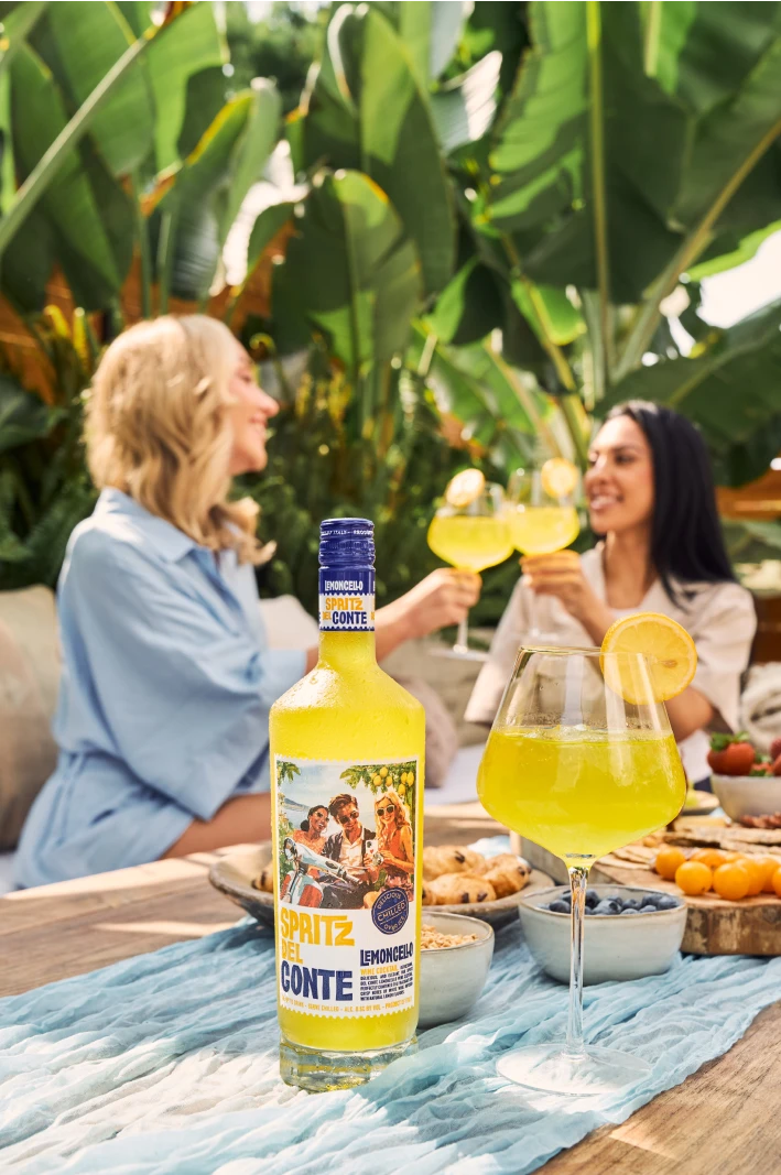 Two people enjoying Spritz Del Conte Lemoncello