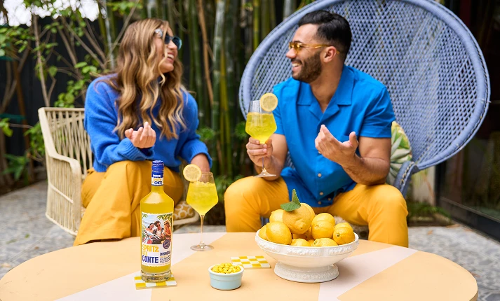 Two people enjoying Spritz Del Conte Lemoncello