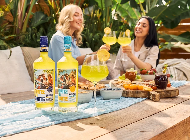 Two people enjoying Spritz Del Conte Lemoncello