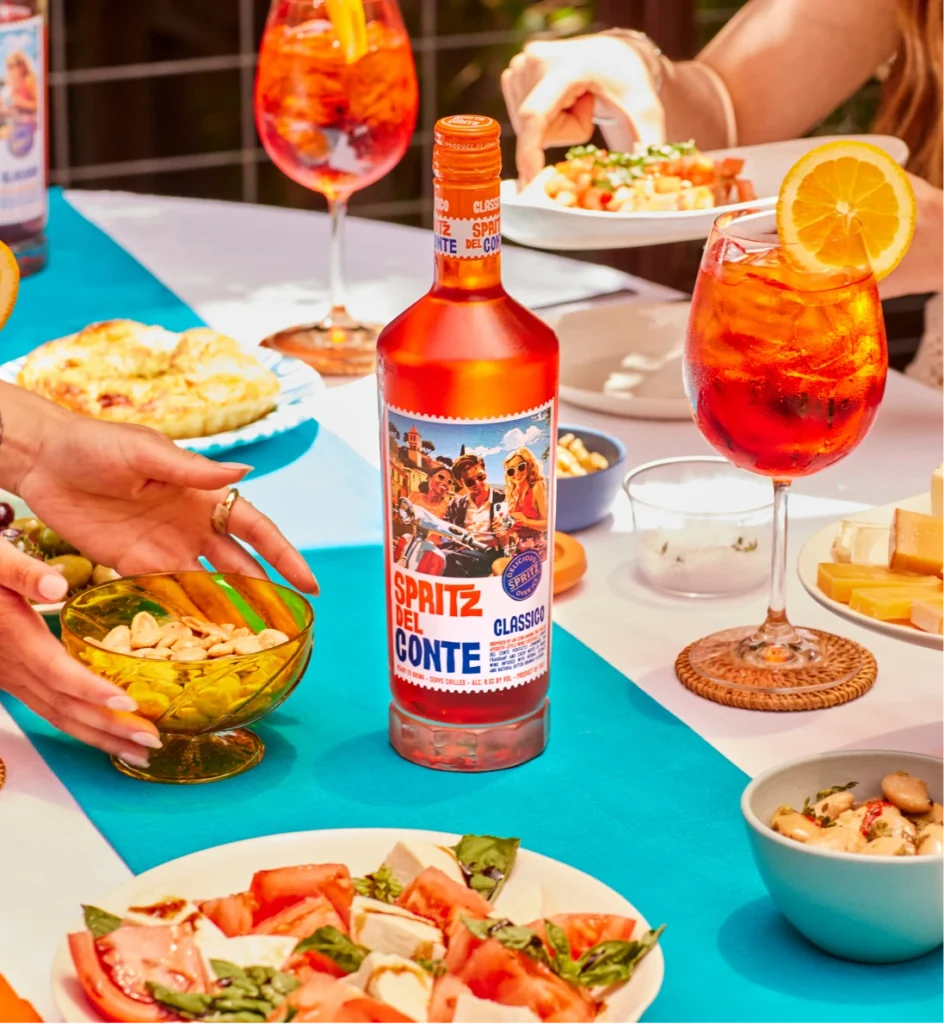 A dinner party with Spritz being enjoyed by the guests